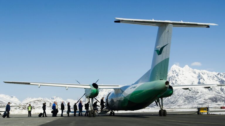 Passengers board a Widerøe plane at a remote Norwegian airport. Photo: Widerøe.