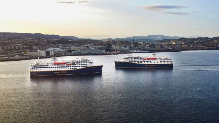 Two of Havila's coastal cruise ferries outside Trondheim, Norway. Photo: Havila Voyages.