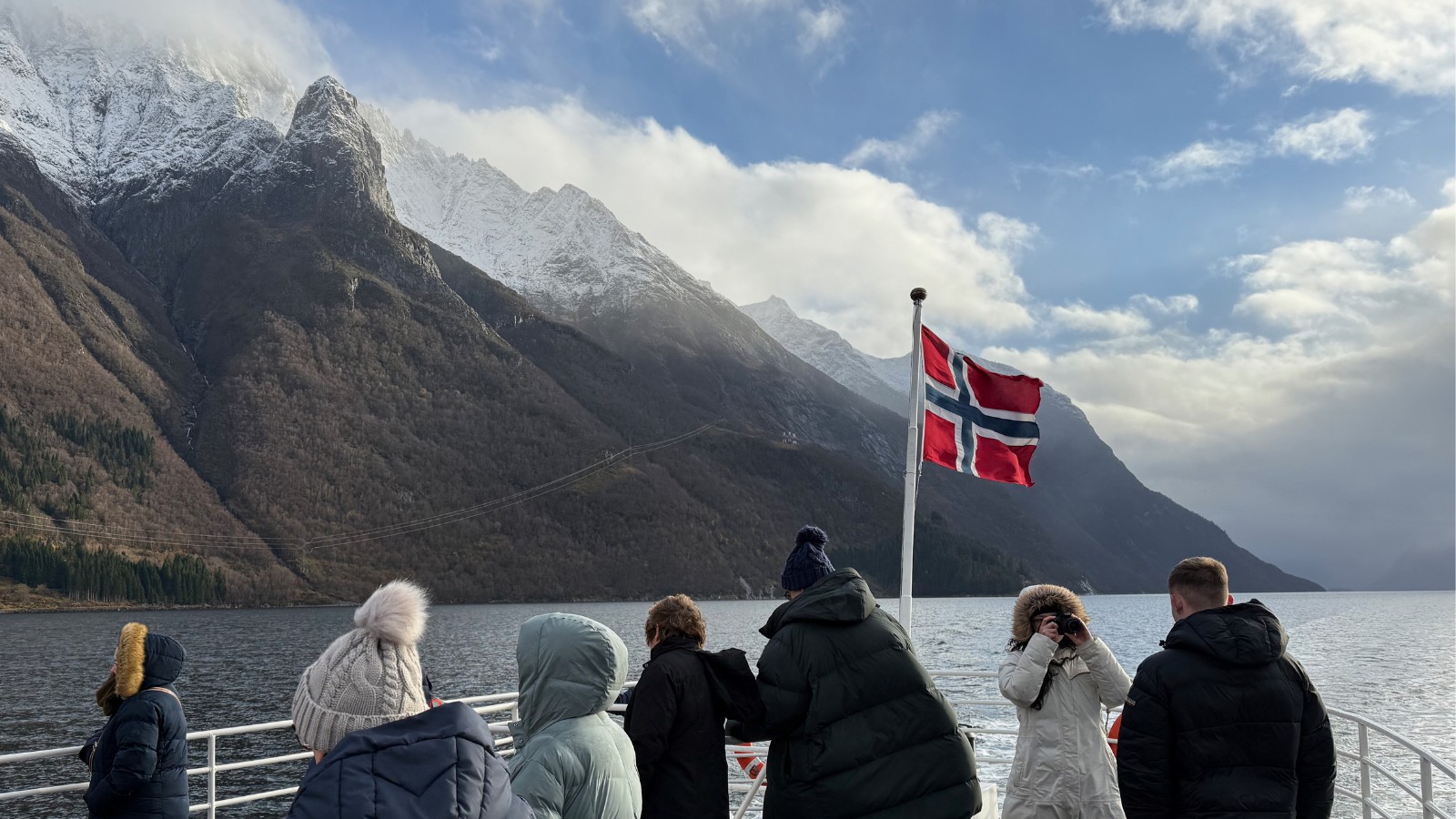 Tourists on a boat trip along Norway's Hjørundfjord. Photo: David Nikel.