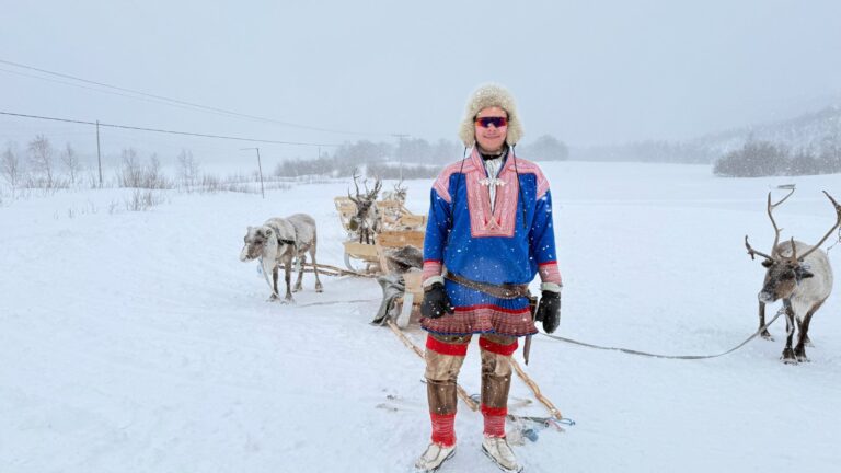 Meeting a Sami man at Maze Sami village. Photo: David Nikel.