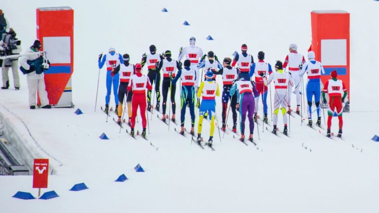 Nordic skiing mass start event.