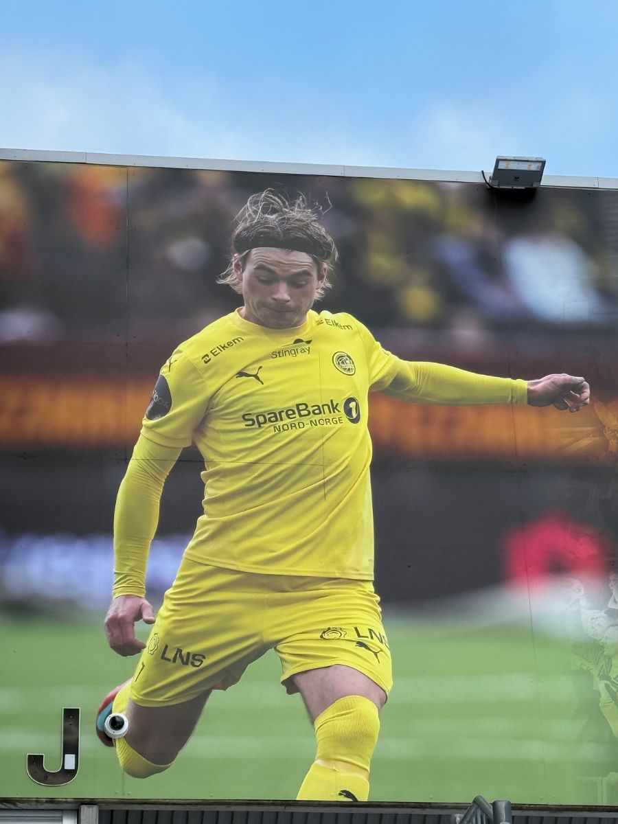 Large picture of Patrick Berg on the outside of Bodø/Glimt's Aspmyra Stadion. Photo: David Nikel.