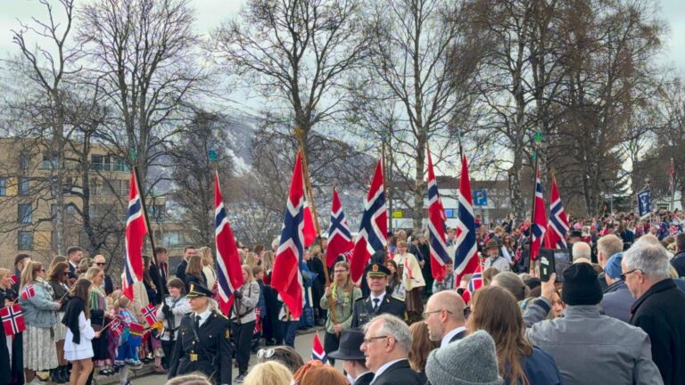 Norwegians marching with flags on Norway's National Day in Tromsø. Photo: David Nikel.
