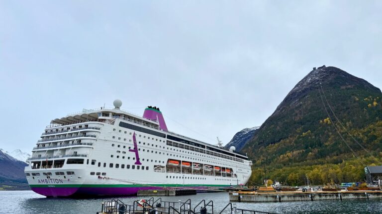 Ambassador Ambition cruise ship docked next to the cable car station in Åndalsnes. Photo: David Nikel.