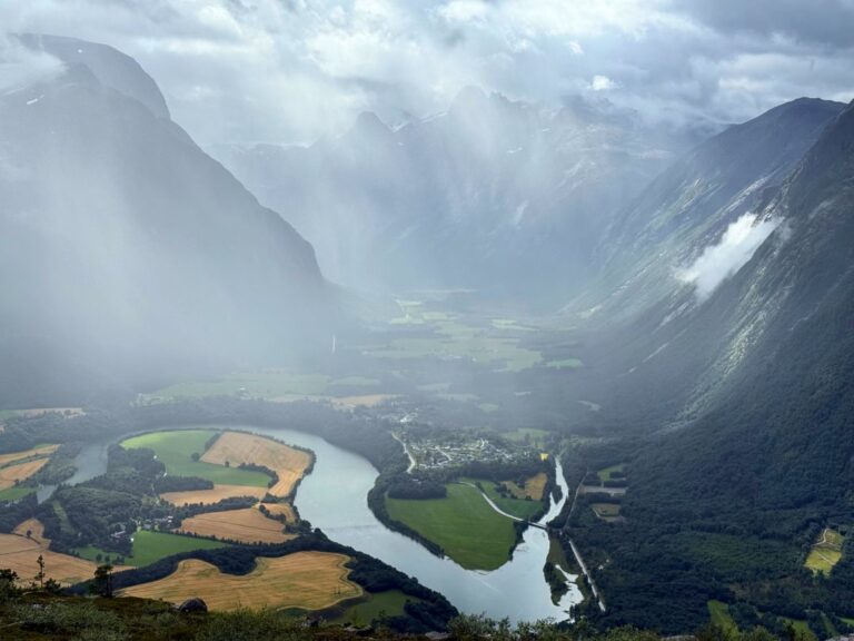 Light breaking through the valley mist in Åndalsnes. Photo: David Nikel.