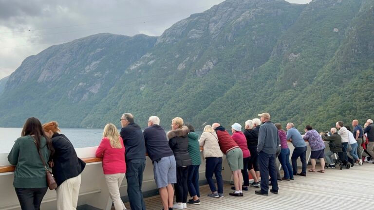 Cruise passengers admire the Lysefjord. Photo: David Nikel.