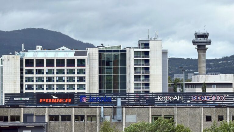 View of Scandic Hell Hotel and Hell shopping centre with the Trondheim Airport control tower in the background.