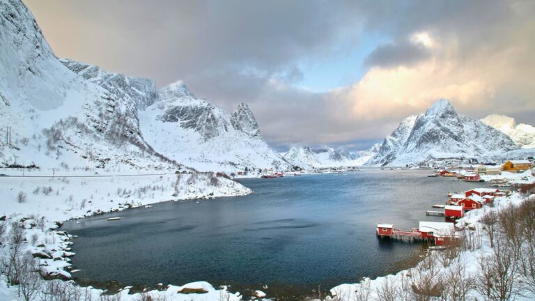 Lofoten cabins by mountains.